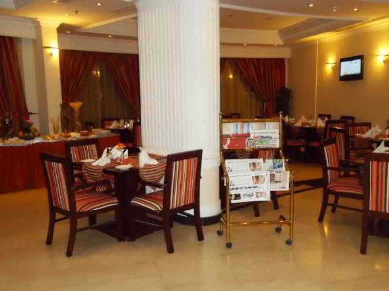 מנאמה Ramee California Hotel מסעדה תמונה